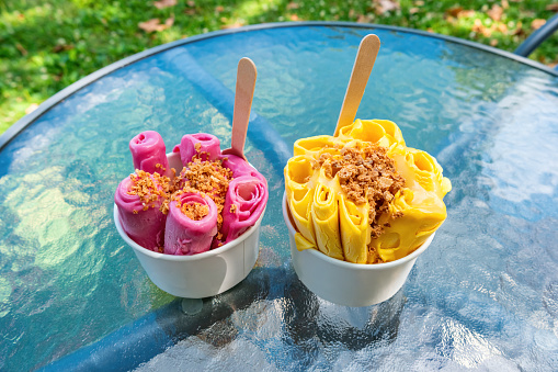 Colorful rolled ice cream cups