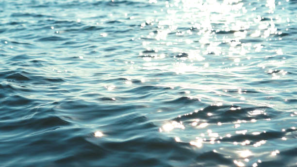 istock Blue Sea Ocean Reflect Sunset Wave Beautiful Nature Luxurious Luxury Texture Textile Material Background BackDrop Aesthetic Elegant Classy Shiny Glossy Wallpaper Expensive Soft Smooth Mockup 1679176884