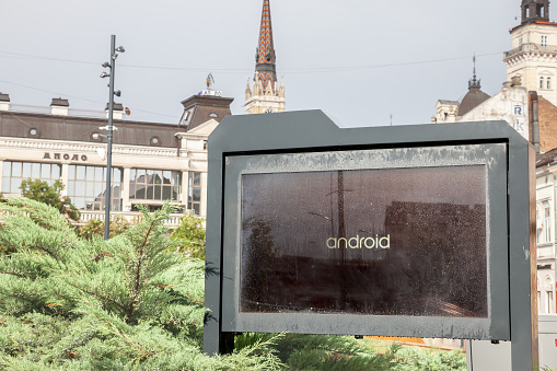 Picture of a screen with the logo of android in a novi sad information screen. Android is a mobile operating system based on a modified version of the Linux kernel and other open-source software, designed primarily for touchscreen mobile devices such as smartphones and tablets.