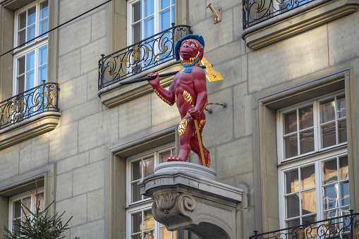 Bern, Switzerland - Nov 25, 2019: Sculpture at Guild Society of the Monkey Facade - Bern, Switzerland