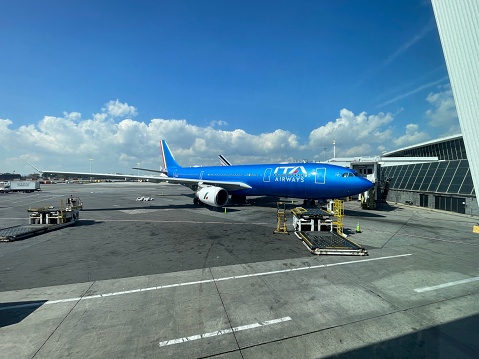 New York City, NY, USA - September 12th 2023: ITA Airways Airbus A330-200 boarding and land operations in New York (JFK) Kennedy Intl. Airport in New York City, United States