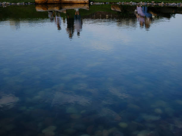 Reflection on a man-made small pond in Songhyun Park near Gwanghwamun, Seoul, Korea.