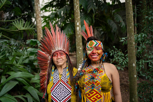 Portrait of  Indian mother and daughter in the forest