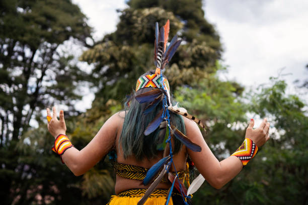 istock Indian woman doing sun salutation in the forest 1679388203