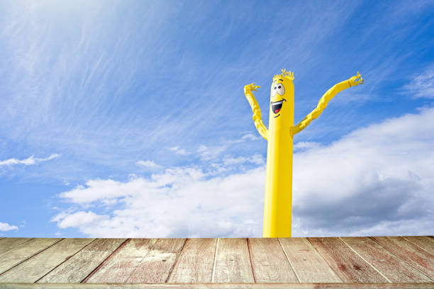 Textured Tabletop Against happy inflatable doll background.