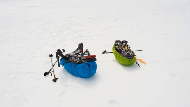 istock Hiker's backpacks and hiking poles. 1679465549