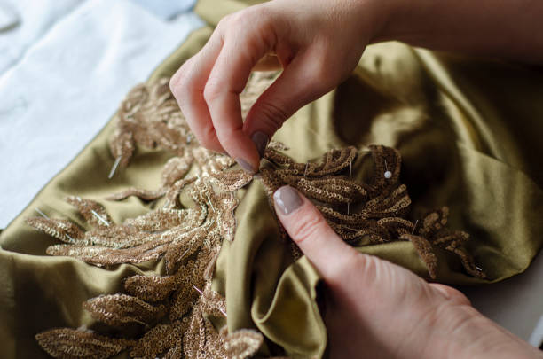 istock Tailor Sews a Dress 1 1679481892