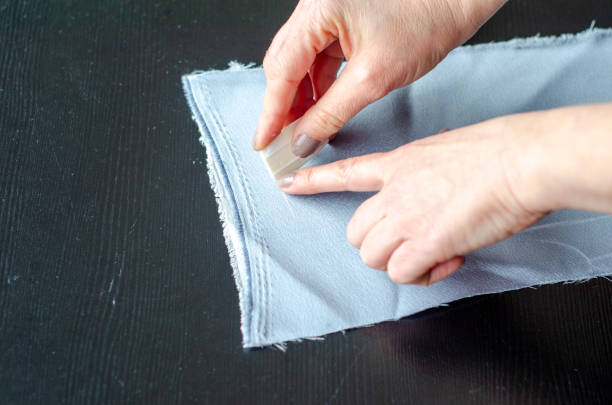 istock Tailor Sews a Dress 1 1679482443