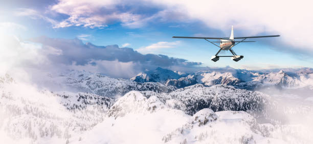 istock Seaplane flying over the Rocky Mountains. BC, Canada 1679487739