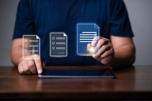 istock E-signing  paperless concept, businessman using laptop and signing on electronic document for paperless office concept. online data management, approve, online database. 1679516045