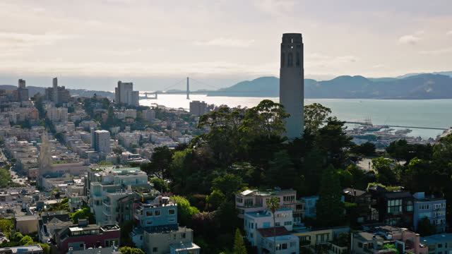 Drone Flight Past Coit Tower with Golden Gate Bridge Beyond