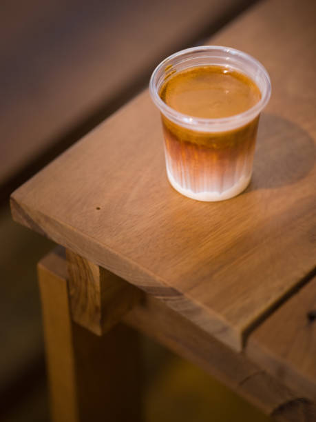 istock Dirty coffee on wooden table 1679583943