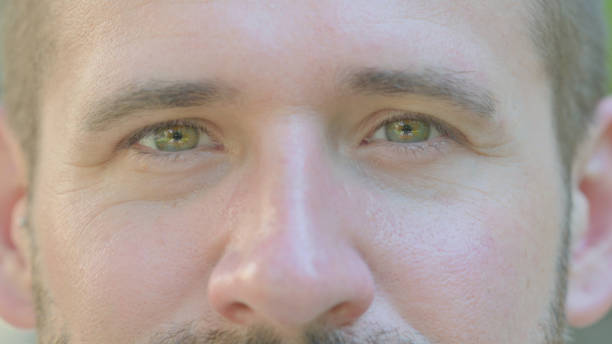 istock Close up of Male Blinking Eyes 1679600986
