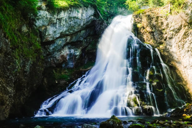 istock soft waterfall in a canyon during hiking in salzburg austria 1679620687