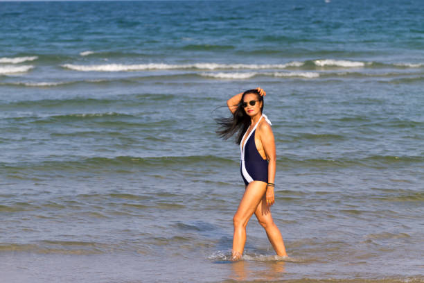 istock Woman body beautiful with bikini relax on beach 1679654904