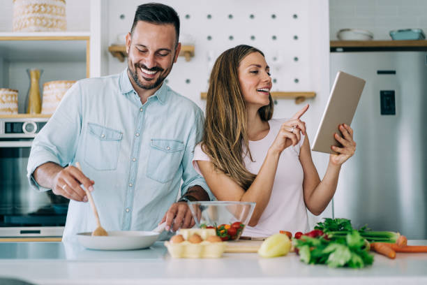 istock Young couple in the kitchen. 1679664848
