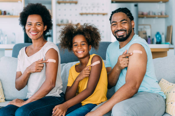 istock Family showing their arms after getting vaccinated. 1679665593