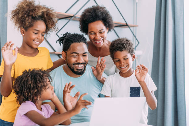 istock Family making video call at home. 1679665976