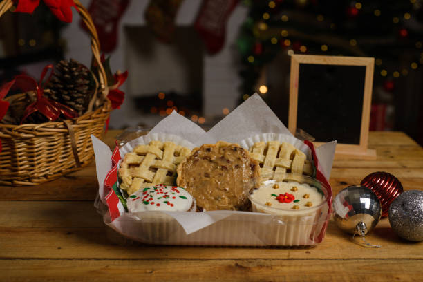 istock Sweet canapes and pastries on a table with a Christmas background. 1679680215