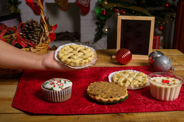 istock Sweet canapes and pastries on a table with a Christmas background. 1679681780