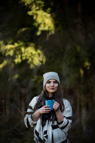 istock Woman portrait in the forest 1679686509