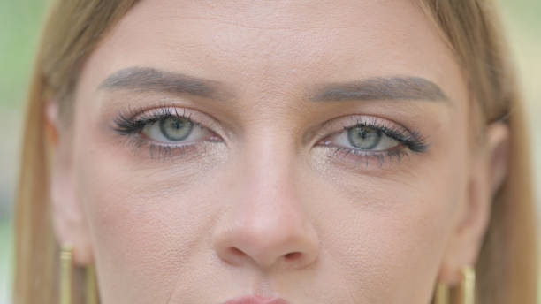 istock Close Up of Blinking Female Eyes 1679710487