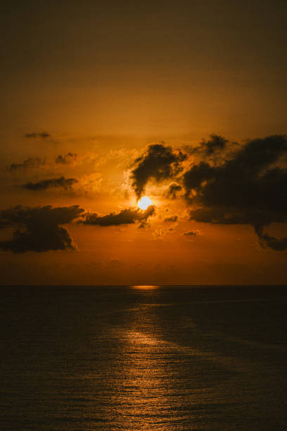 istock sunrise on the sea with clouds 1679763115