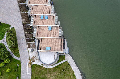 Vertical aerial view of the lakeside residence and grassland