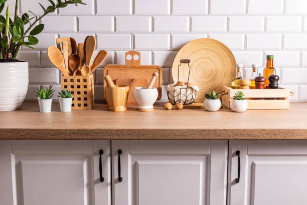 istock A lot of different kitchen utensils and items made from natural materials on the kitchen countertop. ecologically clean kitchen. Eco style. 1679810279