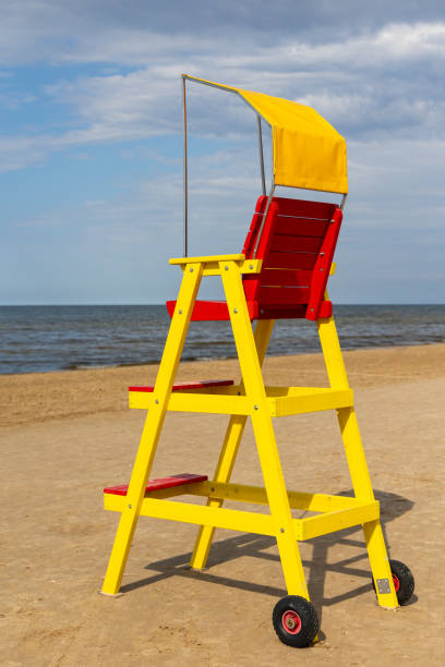 istock Empty lifeguard chair on the sea beach. 1679821512