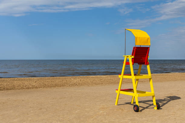 istock Empty lifeguard chair on the sea beach. 1679822054