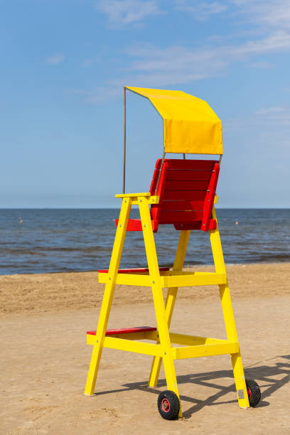 istock Empty lifeguard chair on the sea beach. 1679822068