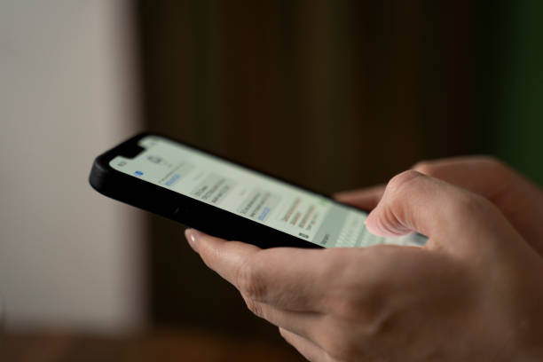 istock Close-up of women's hands using a smartphone, typing a message in messengers 1679828666