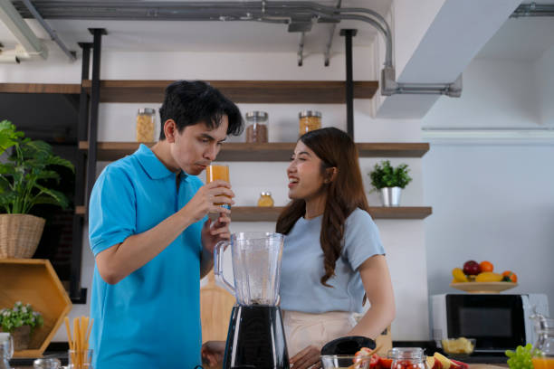istock Couple make a meal at home. Weekend activity. 1679831967