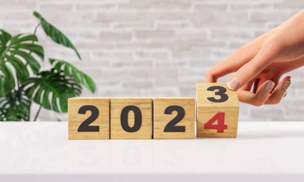 istock number 2023 with one hand changing to 2024 1679831973