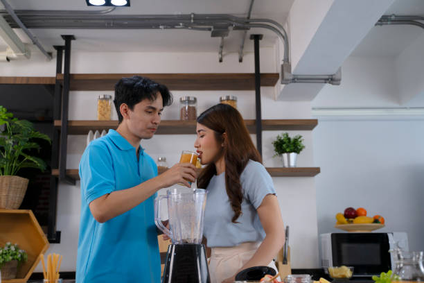 istock Couple make a meal at home. Weekend activity. 1679831980