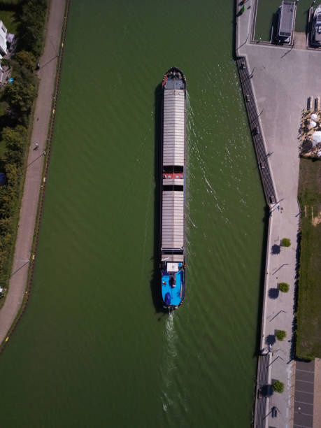 istock barge floats on the channel 1679839093