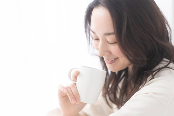istock A woman is drinking a drink. 1679843450