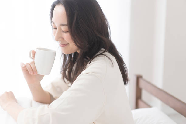 istock A woman is drinking a drink. 1679843456