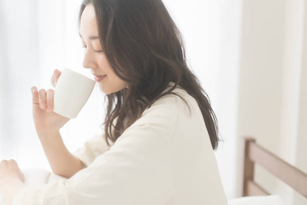 istock A woman is drinking a drink. 1679843458