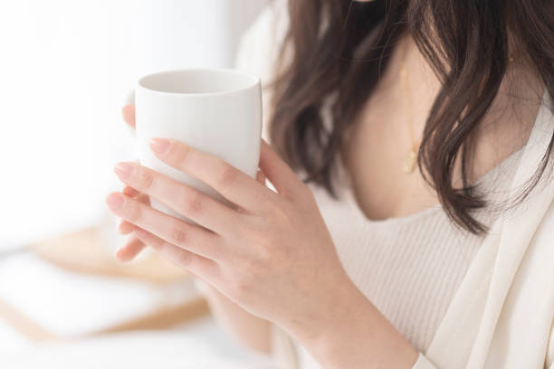istock A woman is drinking a drink. 1679844008