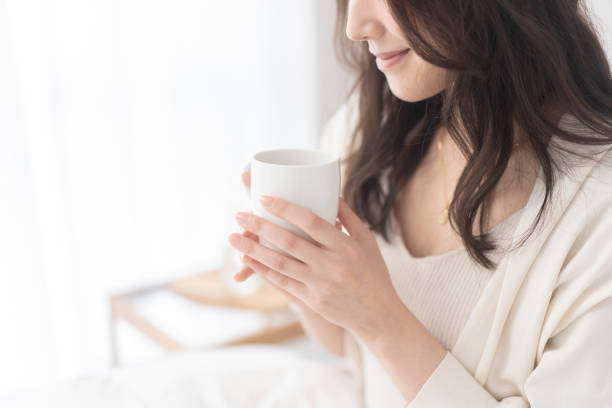 istock A woman is drinking a drink. 1679844014
