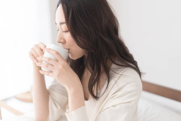 istock A woman is drinking a drink. 1679844023