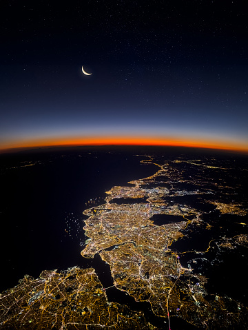 View of Istanbul, Bosphorus, Marmara sea and moon landscape from the airplane at night