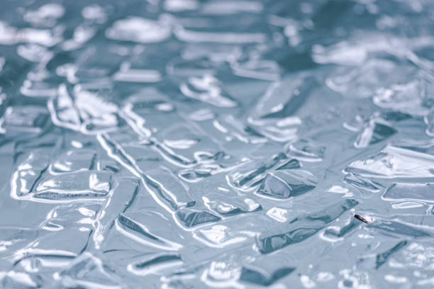 silver texture of crumpled sheet of foil, full frame, element for designer, close up