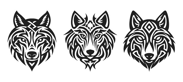 Tribal tattoo of the wolf head in Celtic and Nordic ornament flat style design vector illustration set isolated on white background. Scandinavian Viking symbol of the wolf, tribal northern culture tattoo.