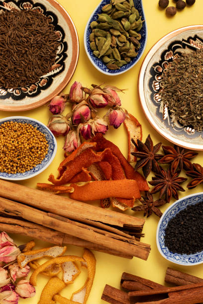 istock Various spices: damask rose, cinnamon, star anise, cardamom, orange peel and others. 1679928421