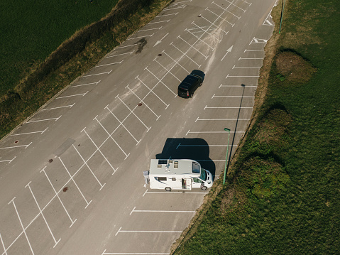 Motor home on a parking lot as seen from above
