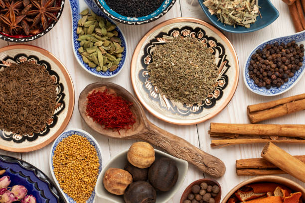 istock Various spices: cinnamon, cardamom, dried limes, saffron, mustard seeds and others. 1679928444