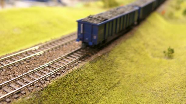 istock Toy Train Models On Railroad Set Mockup - Coal Freight 1679930021